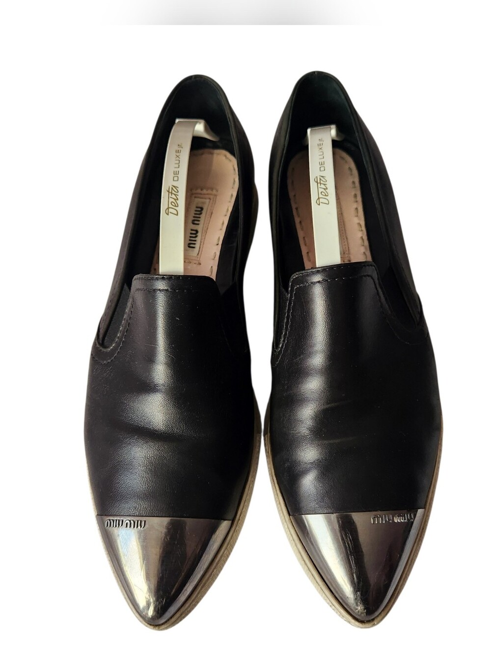 Miu Miu Black Leather Slip-On Loafers with Silver Toe Caps